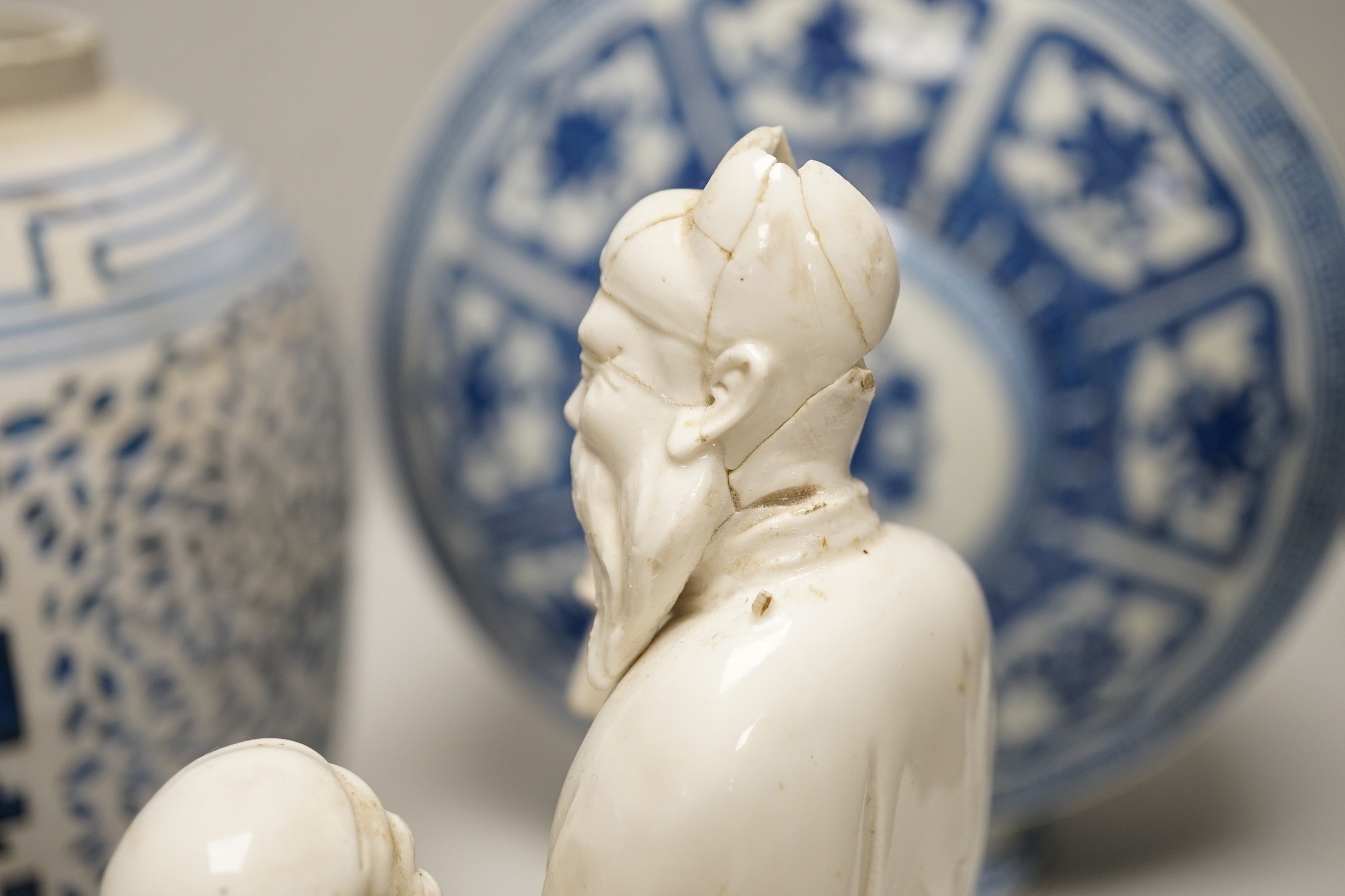 A Chinese blue and white two handled moonflask, together with another Chinese vase and Chinese figure group, tallest 36cm